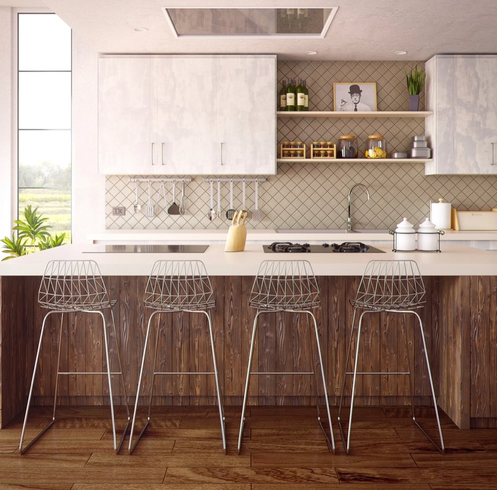 Clean modern kitchen with a wood island, bar stools, and tidy countertops
